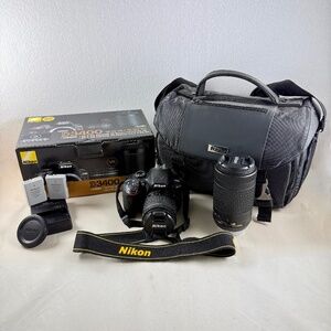Nikon D3400 DSLR Camera, X-tra Zoom lens, Tripod and Accessories.